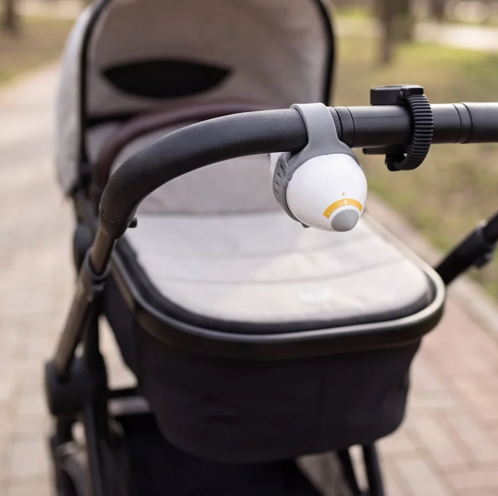 Wiegmotor voor de kinderwagen